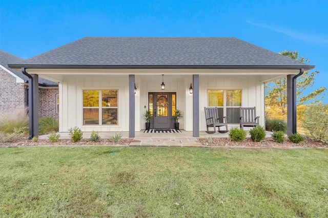 a kitchen with stainless steel appliances granite countertop a stove and a refrigerator