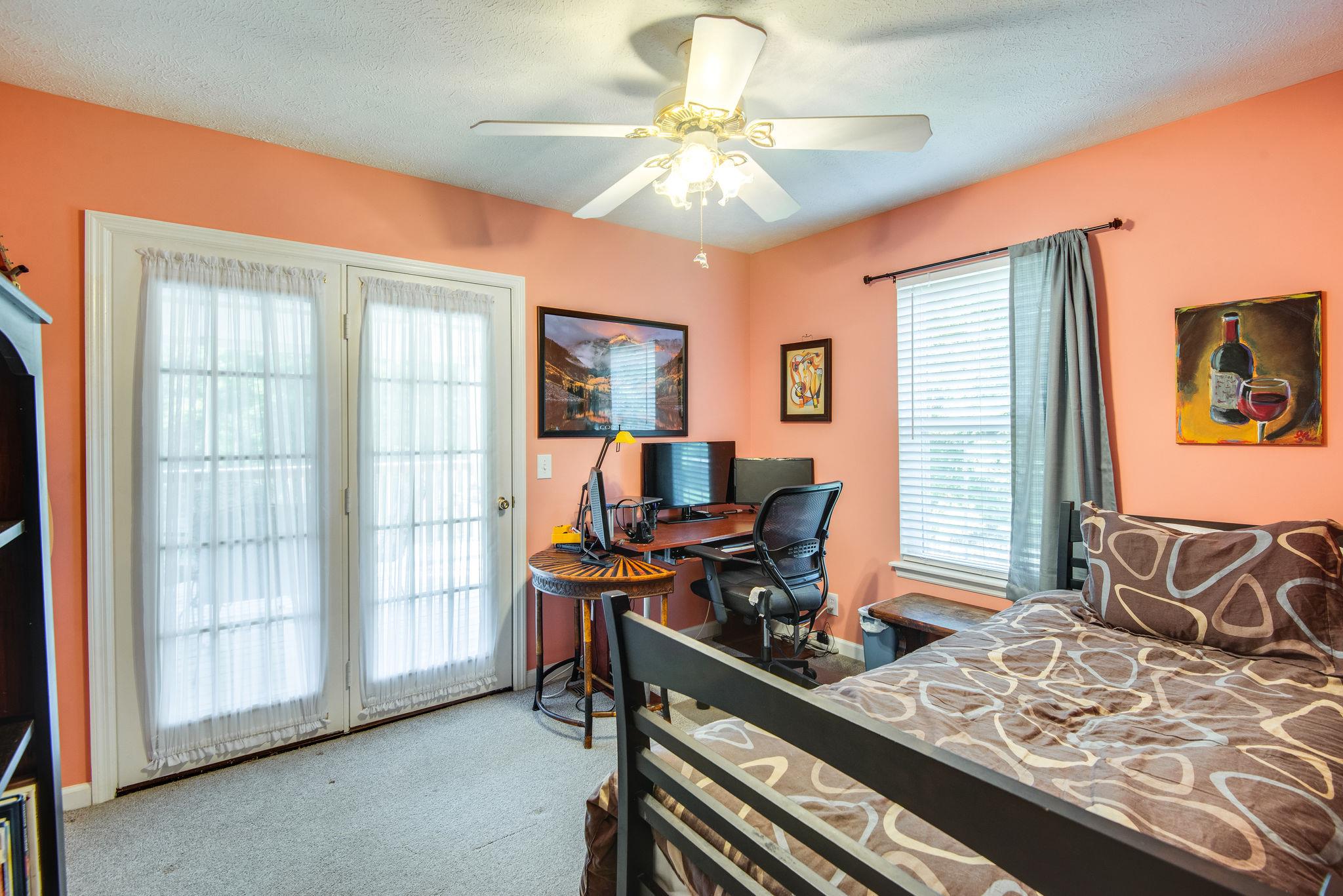 997 Timber Ridge Court Kingston Springs, TN 37082 - Photo 17 of 26 This bedroom features a walk in closet