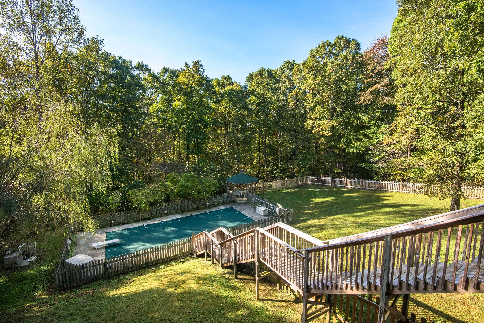 997 Timber Ridge Court Kingston Springs, TN 37082 - Photo 21 of 26 New fence! New stairs & decking!