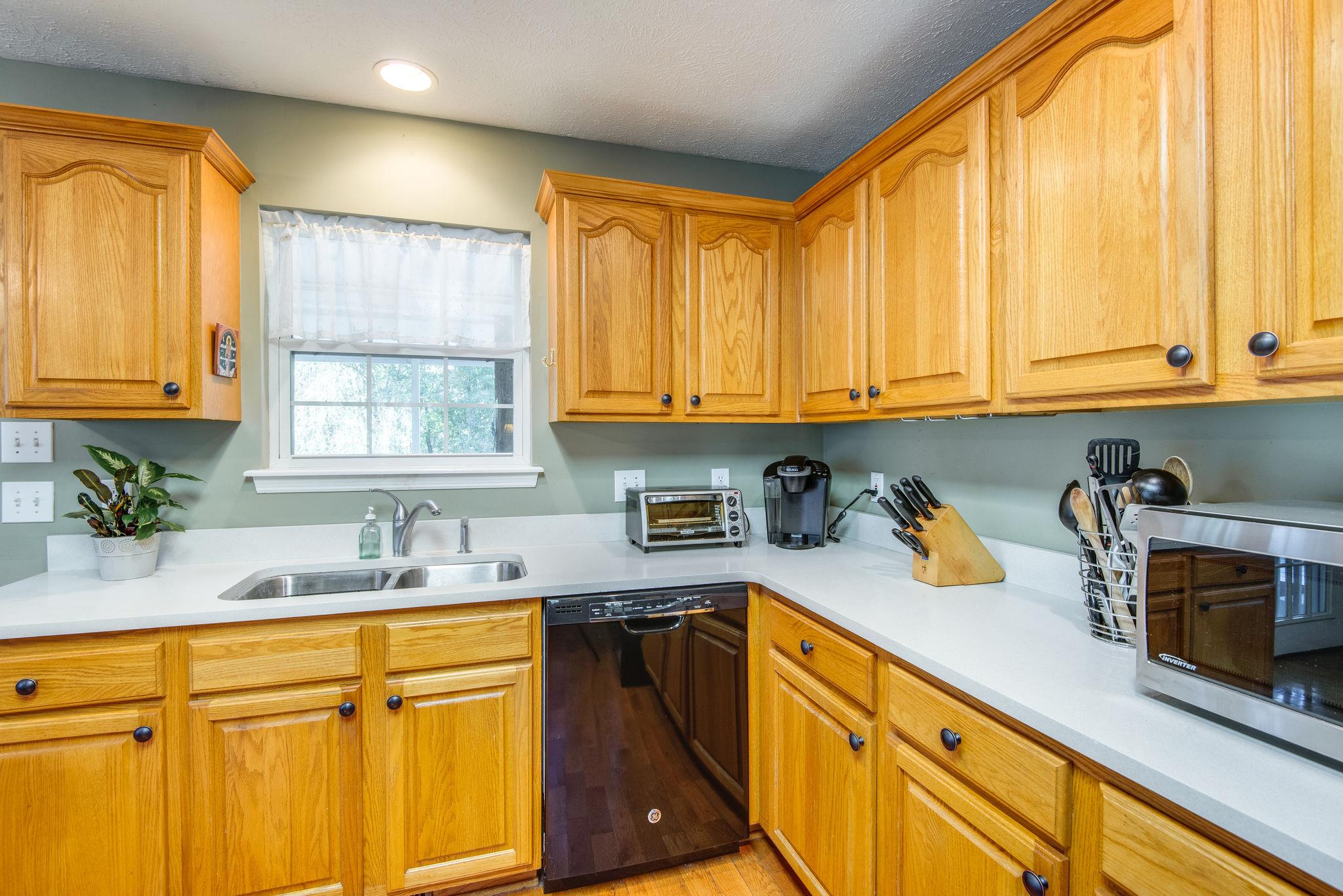 997 Timber Ridge Court Kingston Springs, TN 37082 - Photo 10 of 26 Sunny kitchen with new appliances