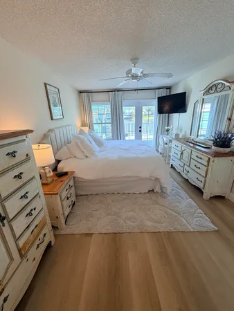 a kitchen with sink cabinets and stove