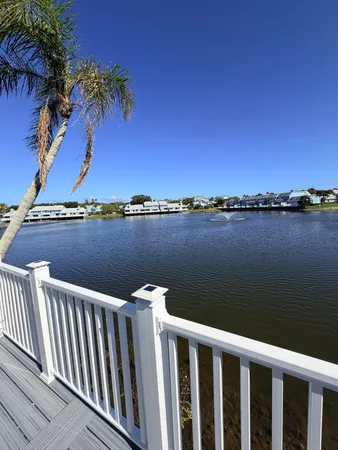 a view of a lake with a terrace