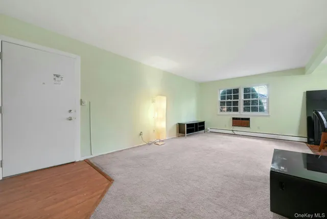 a view of a livingroom with a flat screen tv