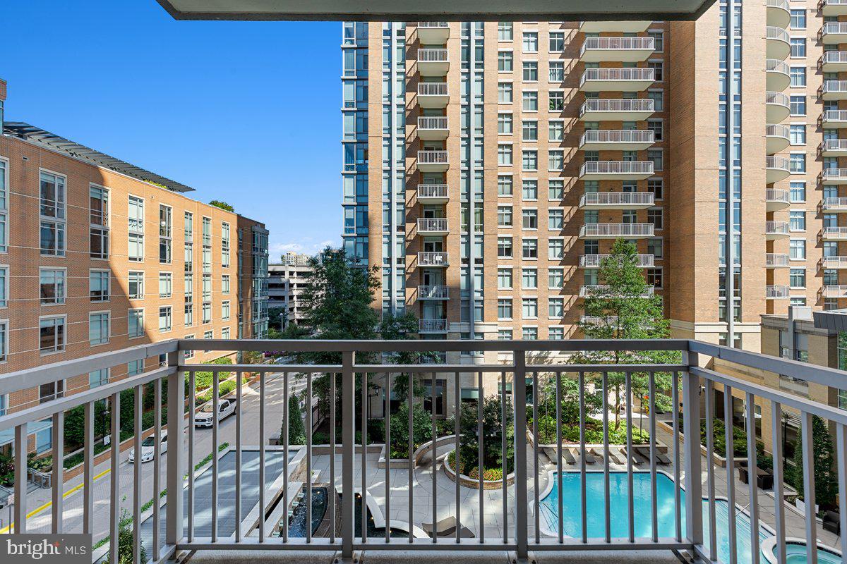 11990 Market Street, Unit 417 Reston, VA 20190 - Photo 27 of 43 Balcony view of pool and courtyard