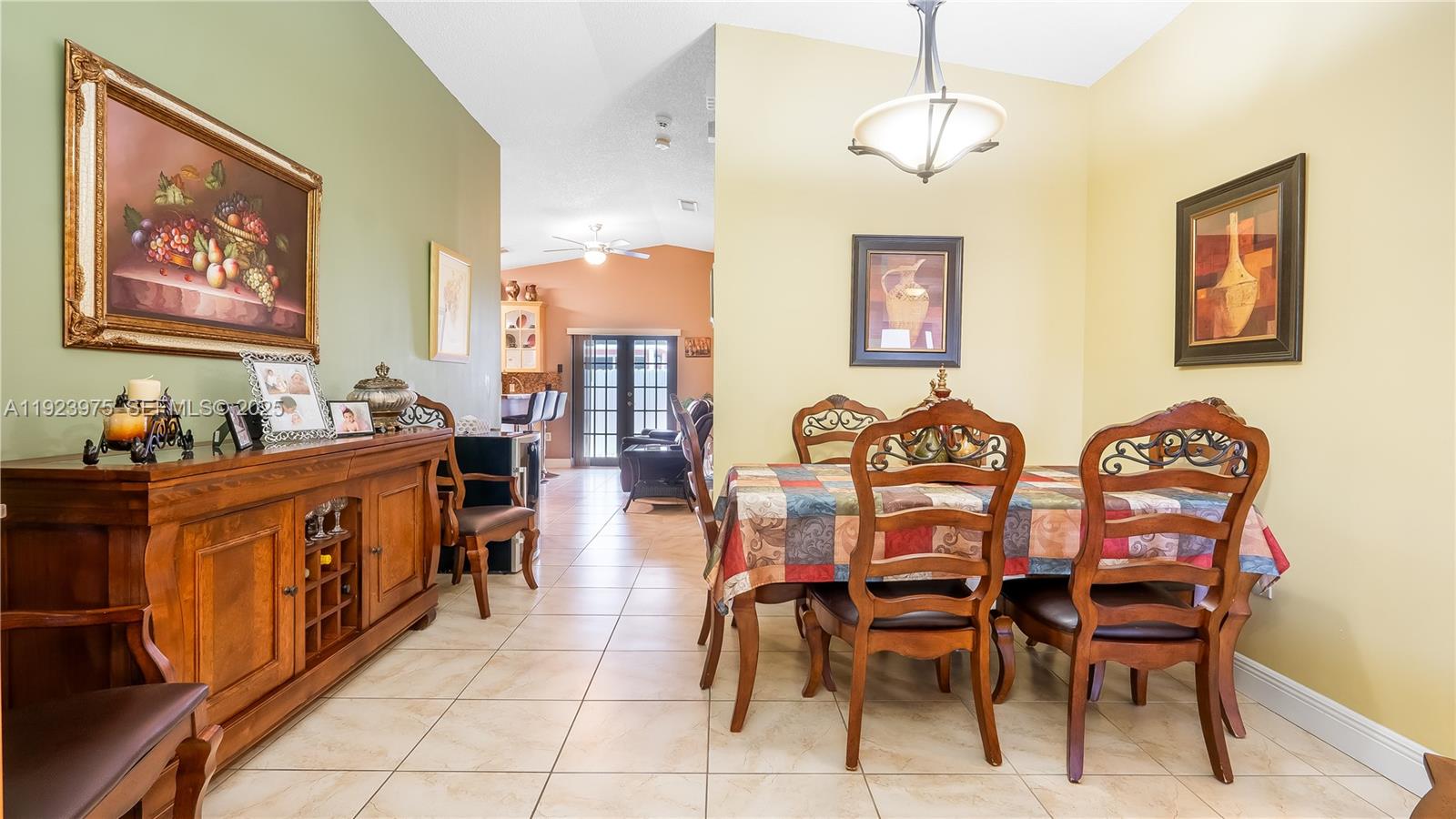 2549 West 72nd Place Hialeah, FL 33016 - Photo 14 of 46 a view of a dining room with furniture