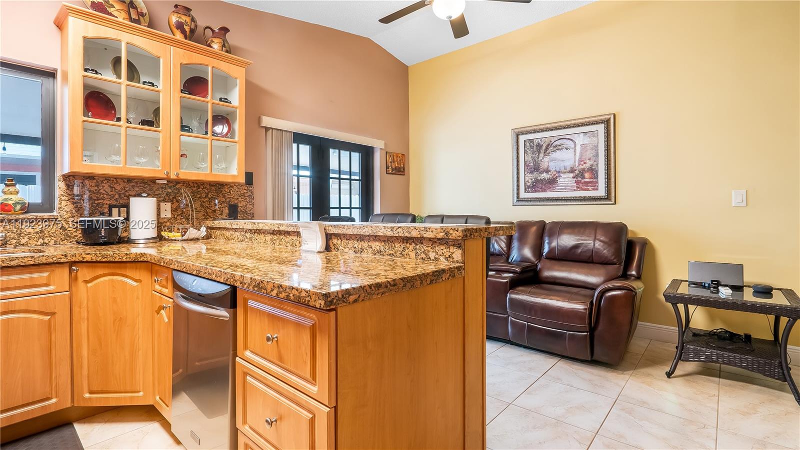 2549 West 72nd Place Hialeah, FL 33016 - Photo 28 of 46 a living room with granite countertop furniture and a sink