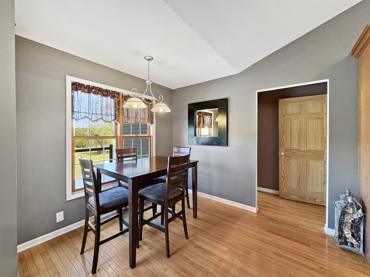 1063 Deer Valley Drive Varna, IL 61375 - Photo 15 of 87 a view of a dining room with furniture window and wooden floor