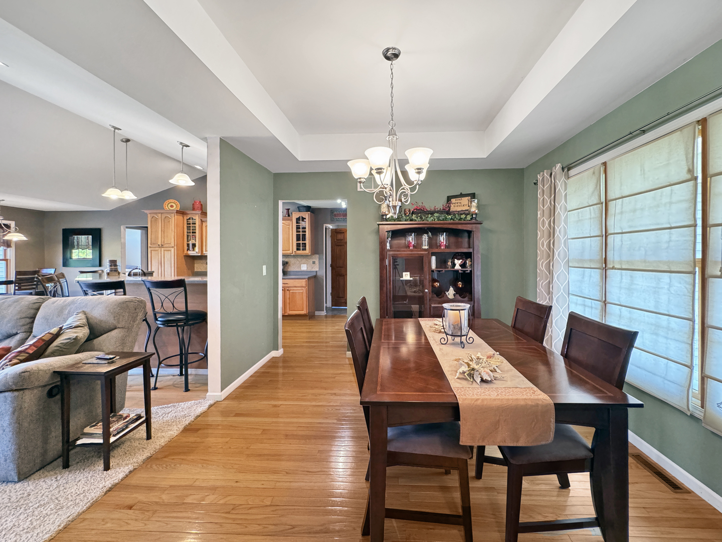 1063 Deer Valley Drive Varna, IL 61375 - Photo 20 of 87 a view of a dining room with furniture and wooden floor