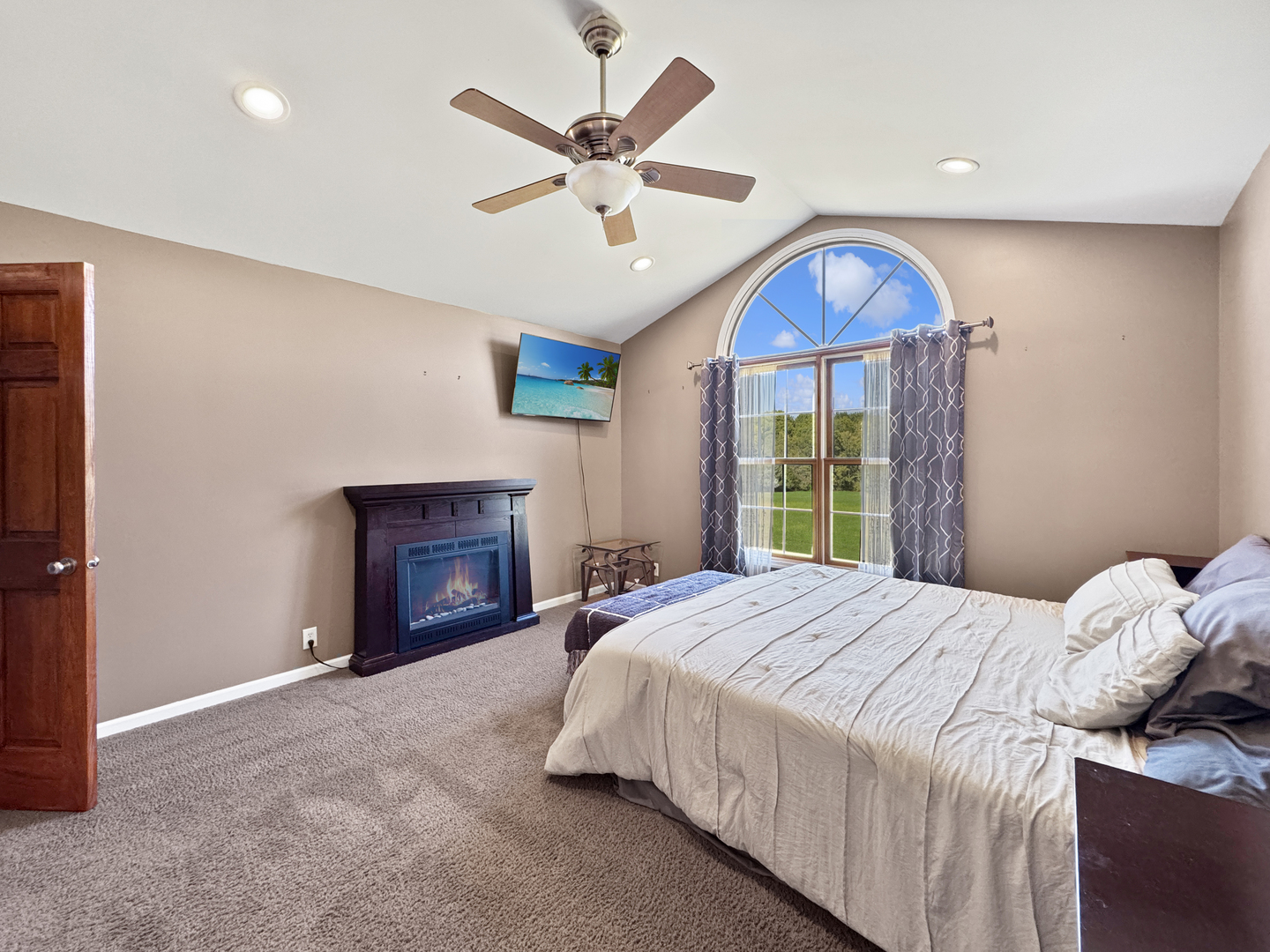 1063 Deer Valley Drive Varna, IL 61375 - Photo 22 of 87 a spacious bedroom with a bed and a fireplace