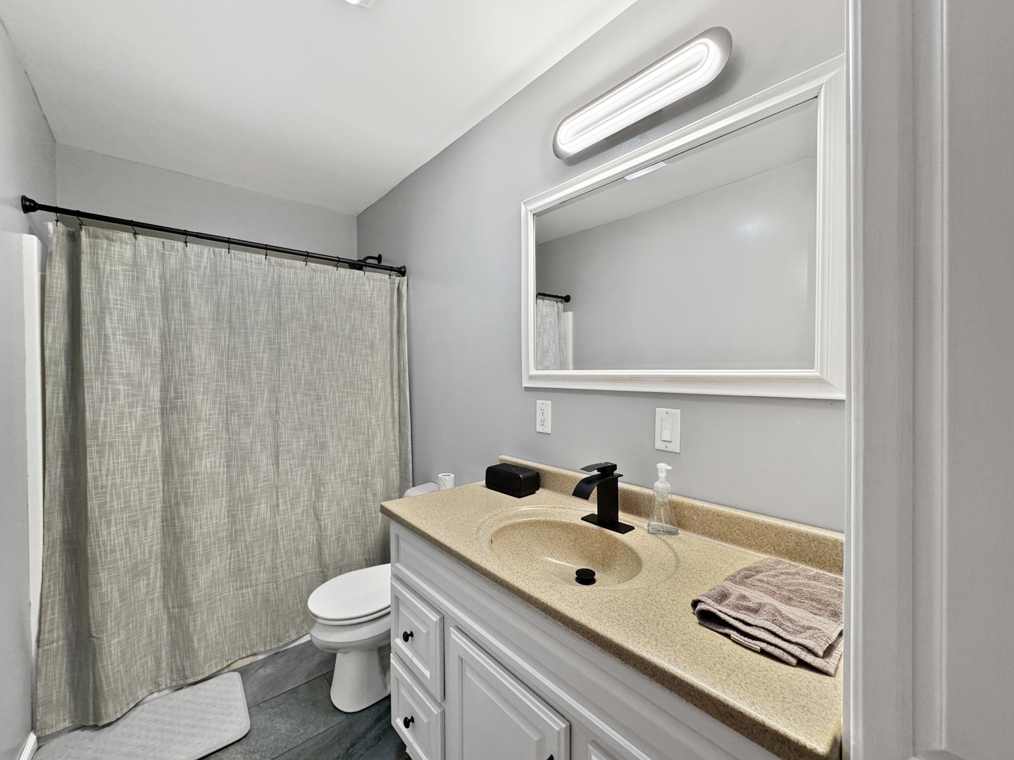 1063 Deer Valley Drive Varna, IL 61375 - Photo 29 of 87 a bathroom with a sink a toilet and shower curtain