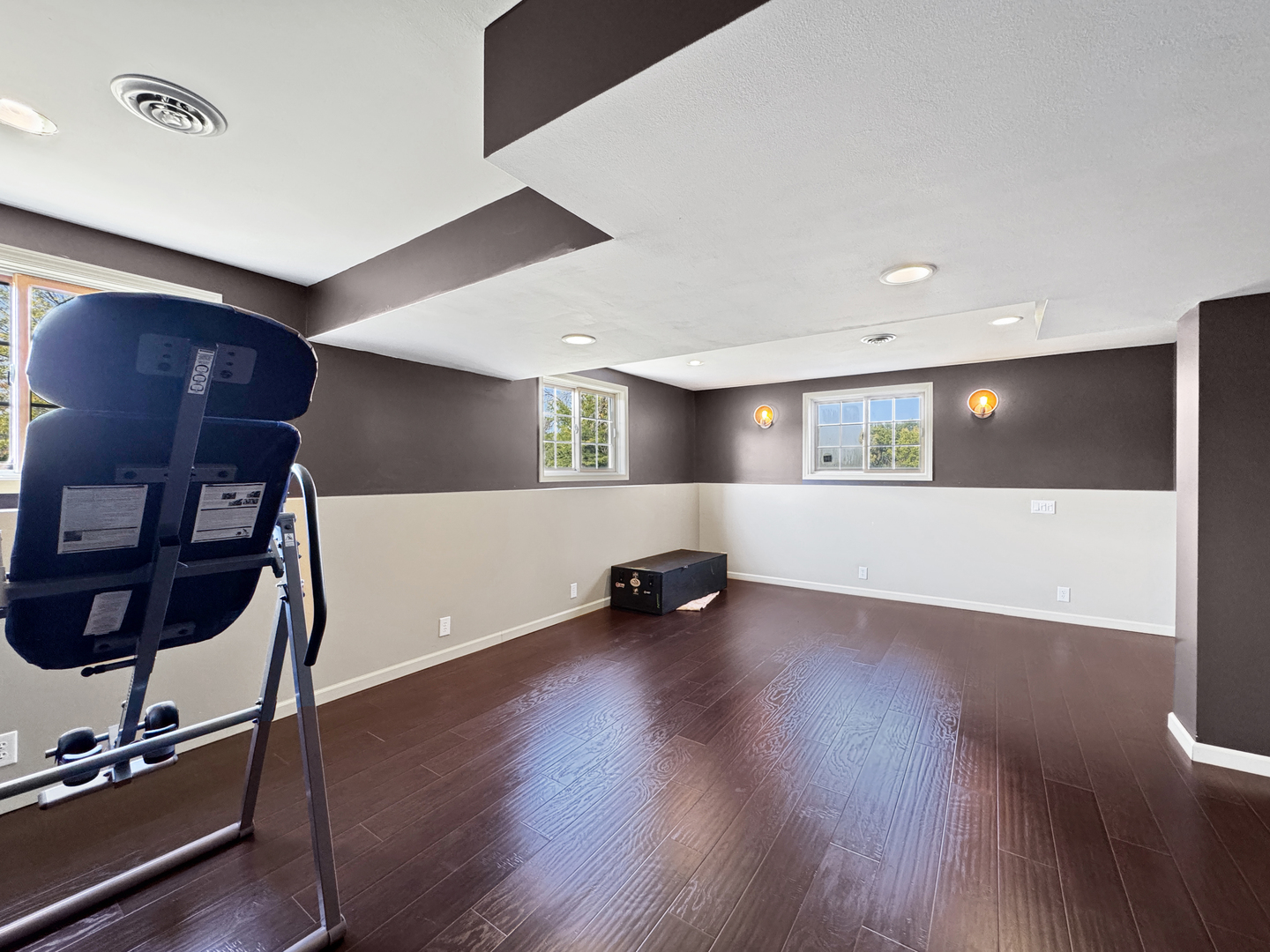 1063 Deer Valley Drive Varna, IL 61375 - Photo 43 of 87 a view of an empty room with wooden floor and furniture