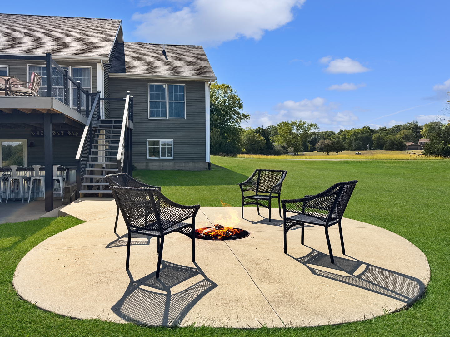 1063 Deer Valley Drive Varna, IL 61375 - Photo 53 of 87 a view of a swimming pool with lawn chairs and a yard