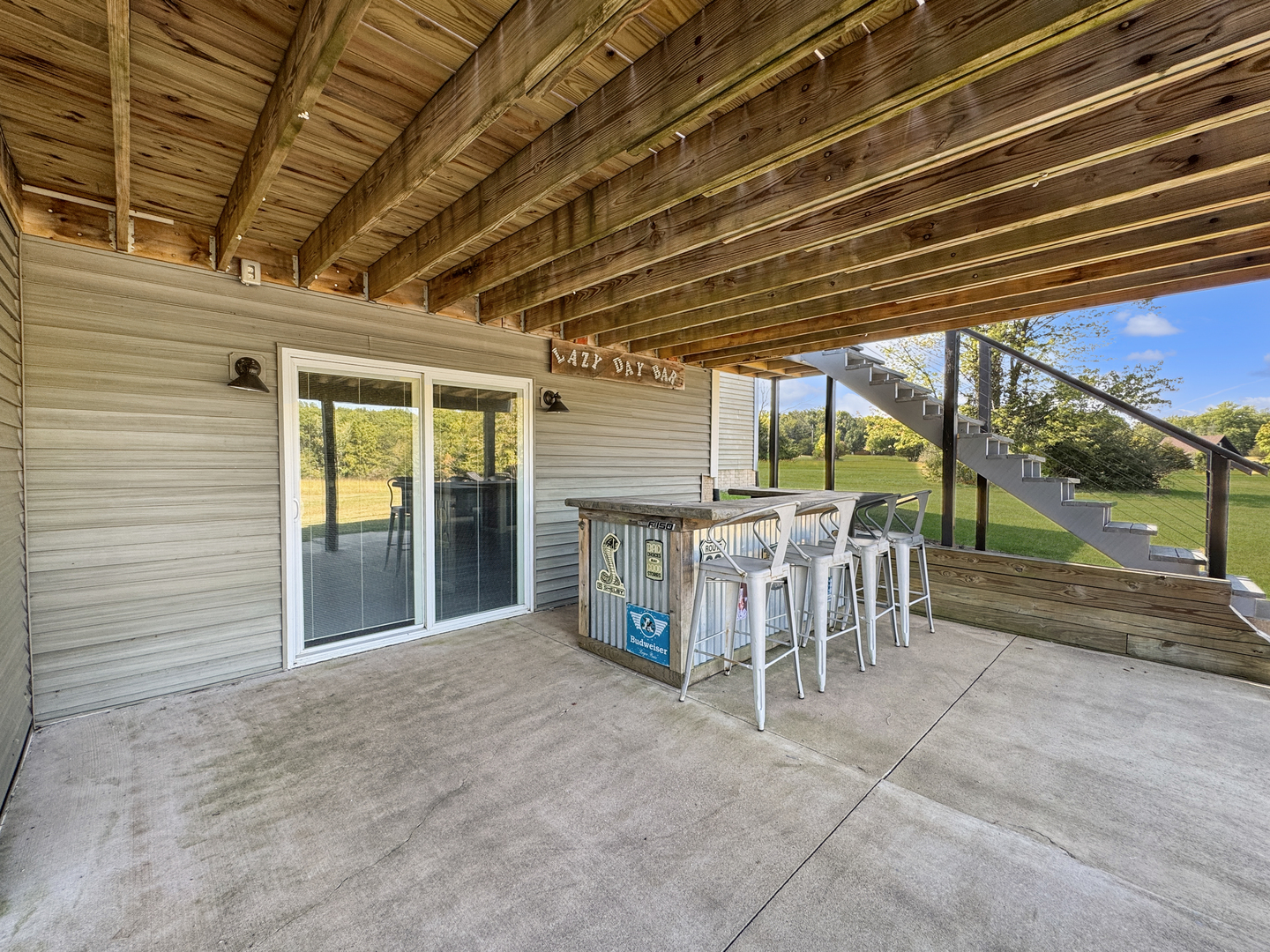 1063 Deer Valley Drive Varna, IL 61375 - Photo 54 of 87 a view of a porch with table and chairs
