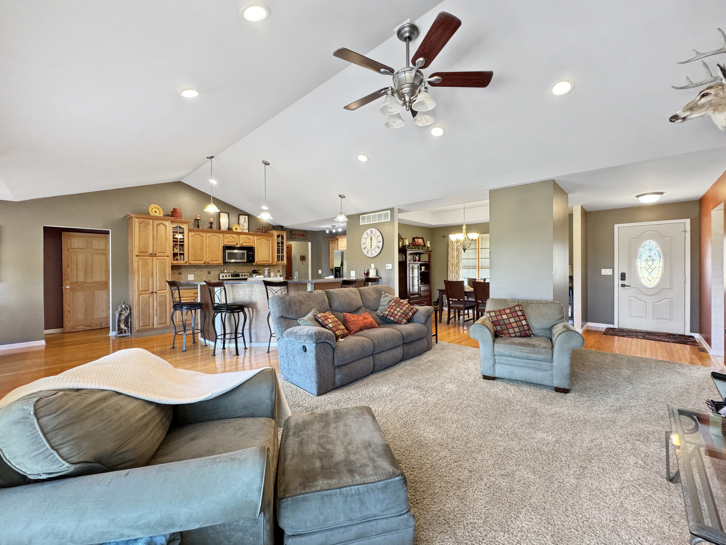 1063 Deer Valley Drive Varna, IL 61375 - Photo 6 of 87 a living room with furniture and wooden floor