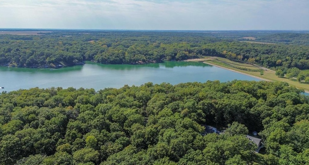 1063 Deer Valley Drive Varna, IL 61375 - Photo 79 of 87 an aerial view of residential house with outdoor space and trees around