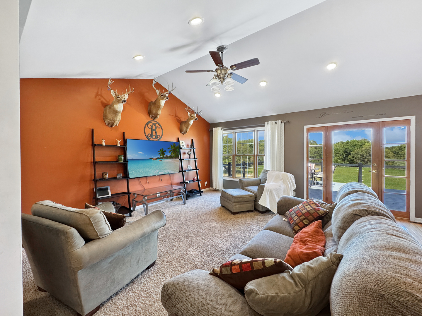 1063 Deer Valley Drive Varna, IL 61375 - Photo 8 of 87 a living room with furniture a ceiling fan and a large window