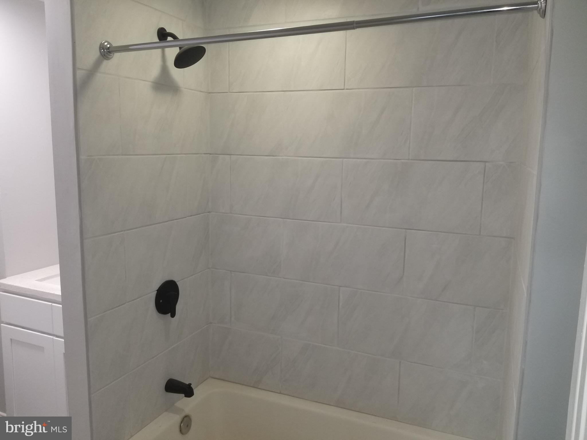 212 Warren Street, Unit 3 Beverly, NJ 08010 - Photo 3 of 18 New Bathroom with Tile