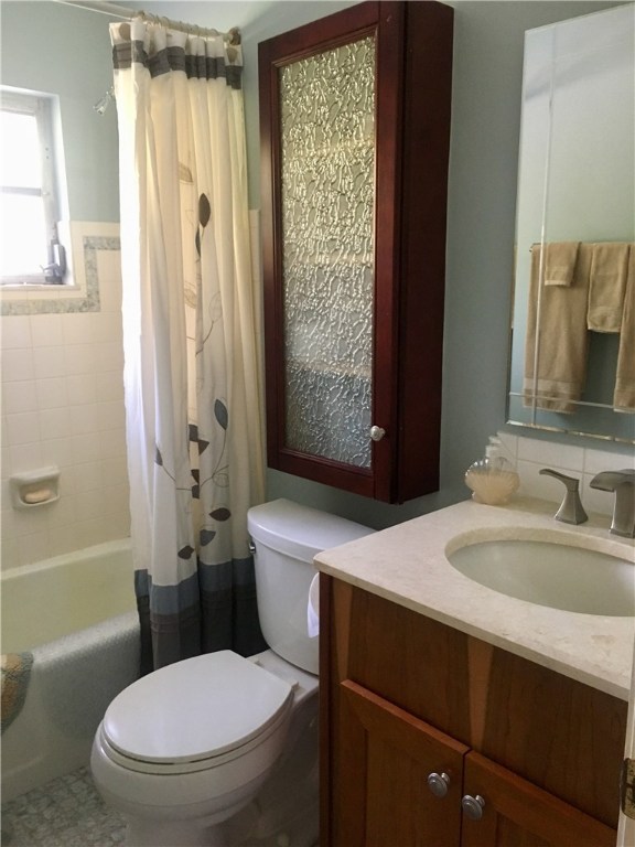 9605 Riverview Drive Micco, FL 32976 - Photo 13 of 36 a bathroom with a sink toilet and shower