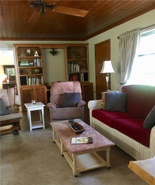 9605 Riverview Drive Micco, FL 32976 - Photo 17 of 36 a living room with furniture and a window