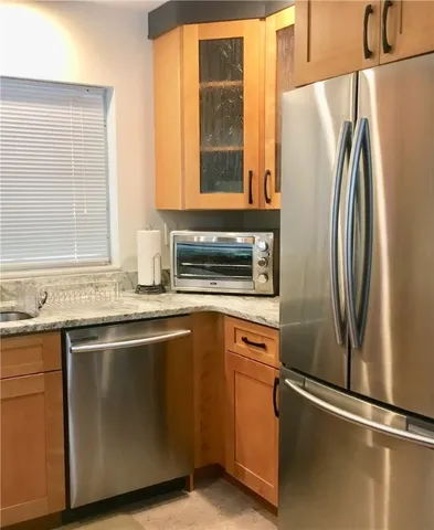 a view of a dining room with furniture and window