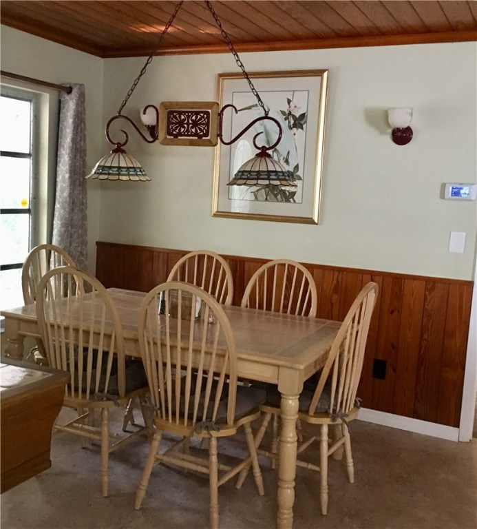 9605 Riverview Drive Micco, FL 32976 - Photo 21 of 36 a view of a dining room with furniture and window