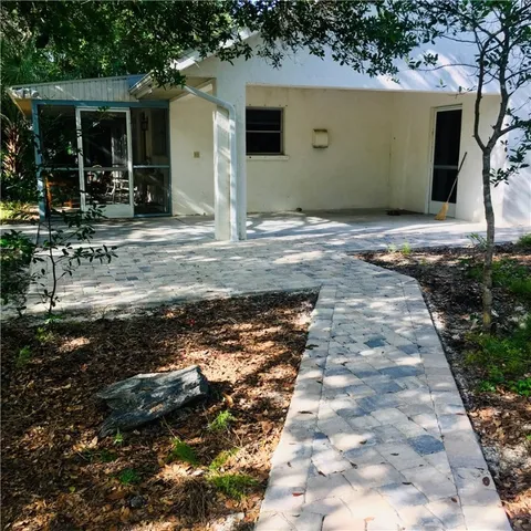 a view of empty space with wooden fence