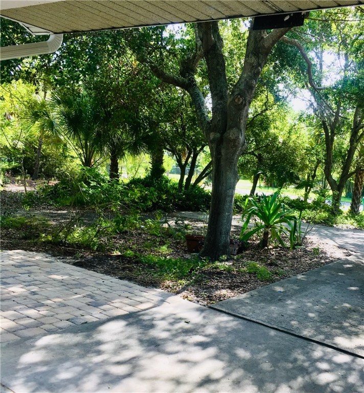 9605 Riverview Drive Micco, FL 32976 - Photo 31 of 36 a pathway of a yard