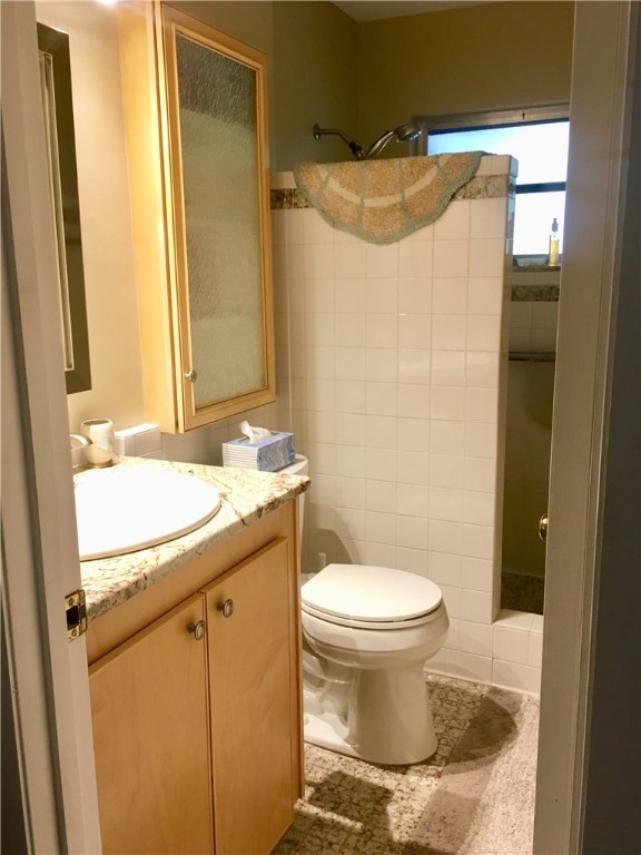 9605 Riverview Drive Micco, FL 32976 - Photo 8 of 36 a bathroom with a sink and a mirror