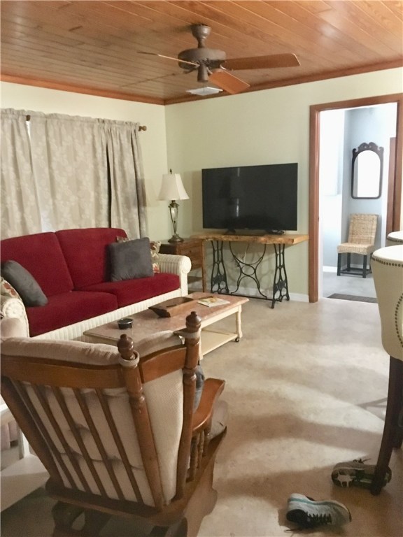 9605 Riverview Drive Micco, FL 32976 - Photo 9 of 36 a living room with furniture and a flat screen tv