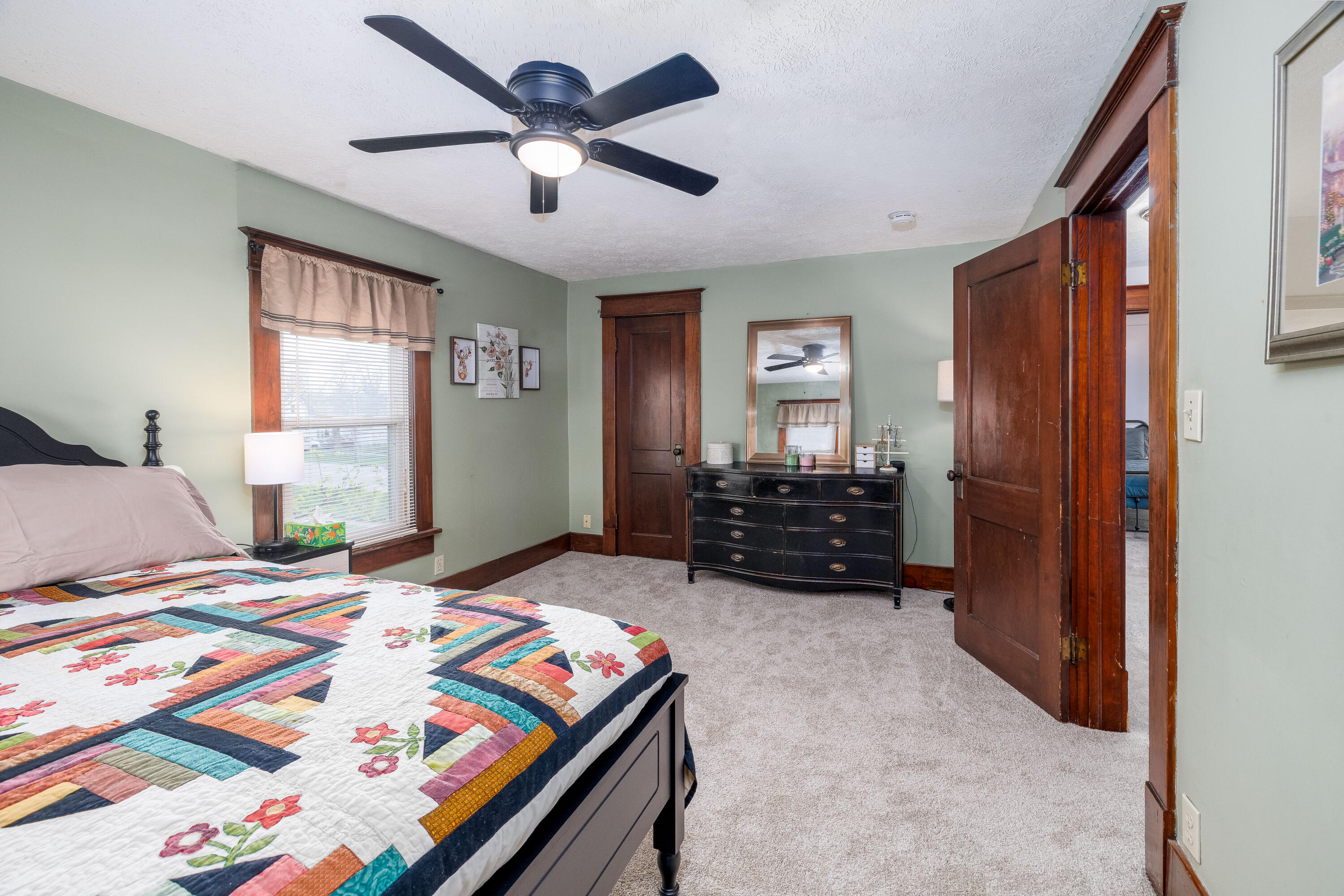 521 North McKinley Avenue Rensselaer, IN 47978 - Photo 25 of 38 a bedroom with a bed dresser and a window