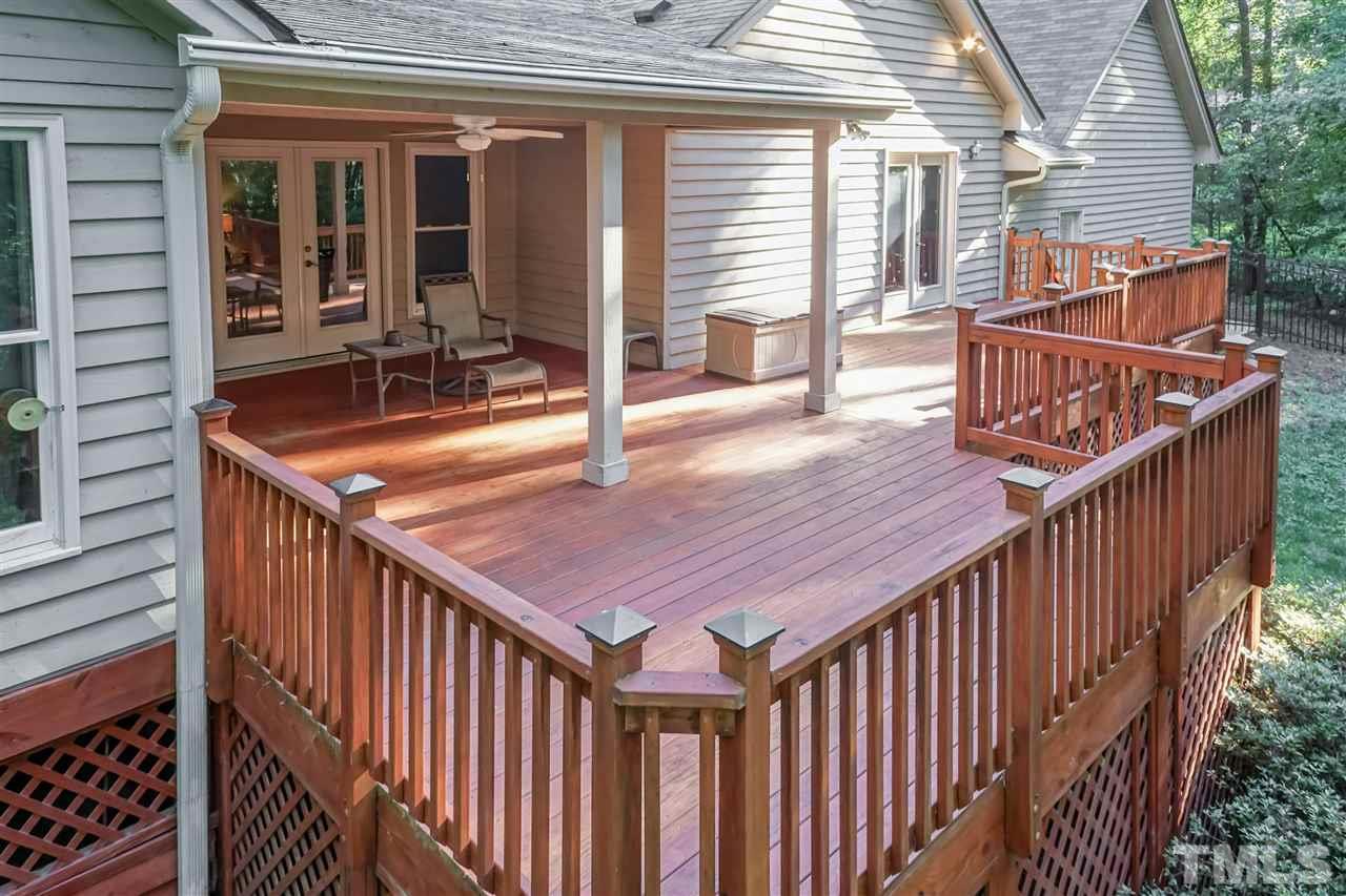712 Misty Isle Place Raleigh, NC 27615 - Photo 27 of 30 a balcony with table and chairs