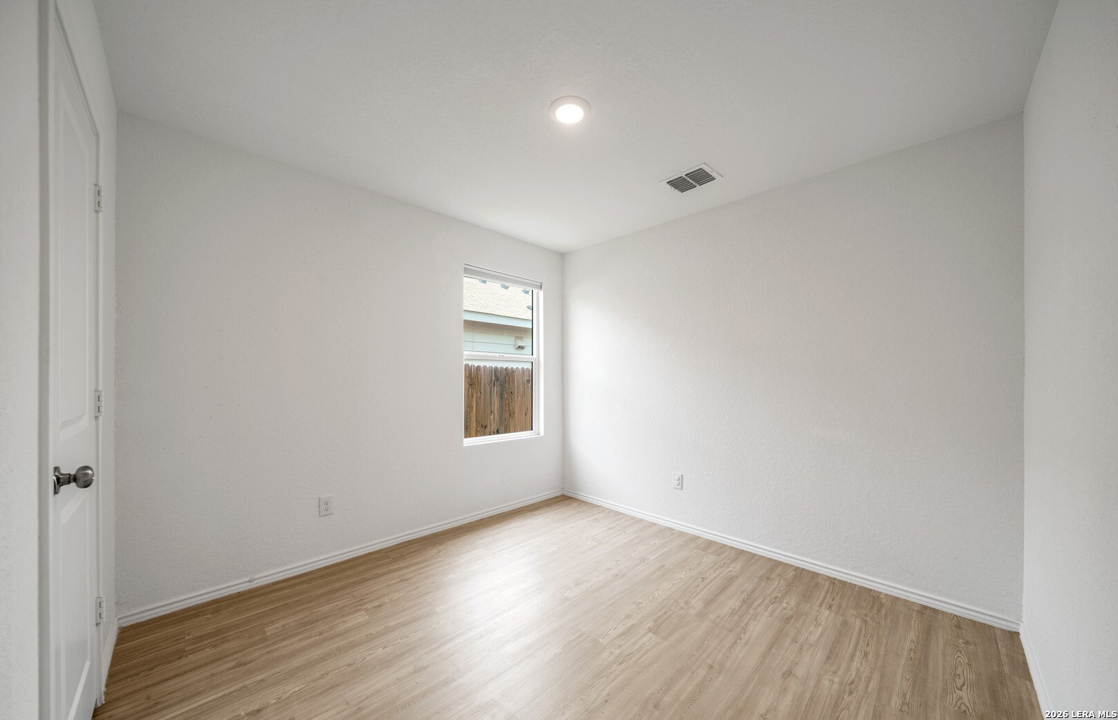 6566 Runaway Row Converse, TX 78109 - Photo 19 of 27 wooden floor in an empty room