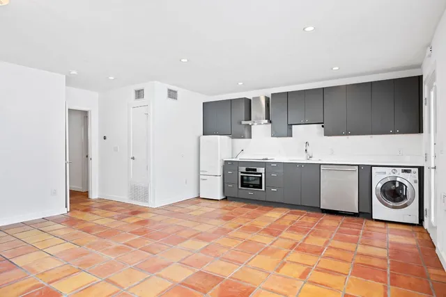 a utility room with washer and dryer