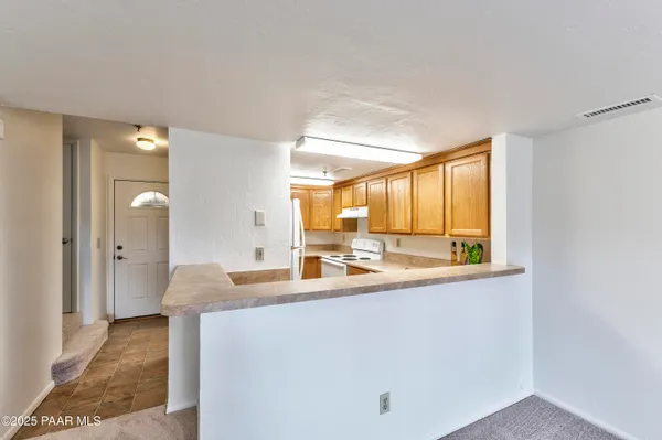 a view of livingroom with furniture and window