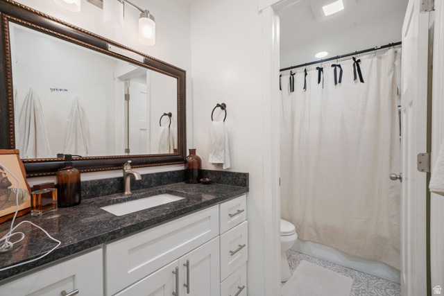 2030 Nevada Circle Provo, UT 84606 - Photo 10 of 16 Full bathroom with vanity and shower / tub combo with curtain