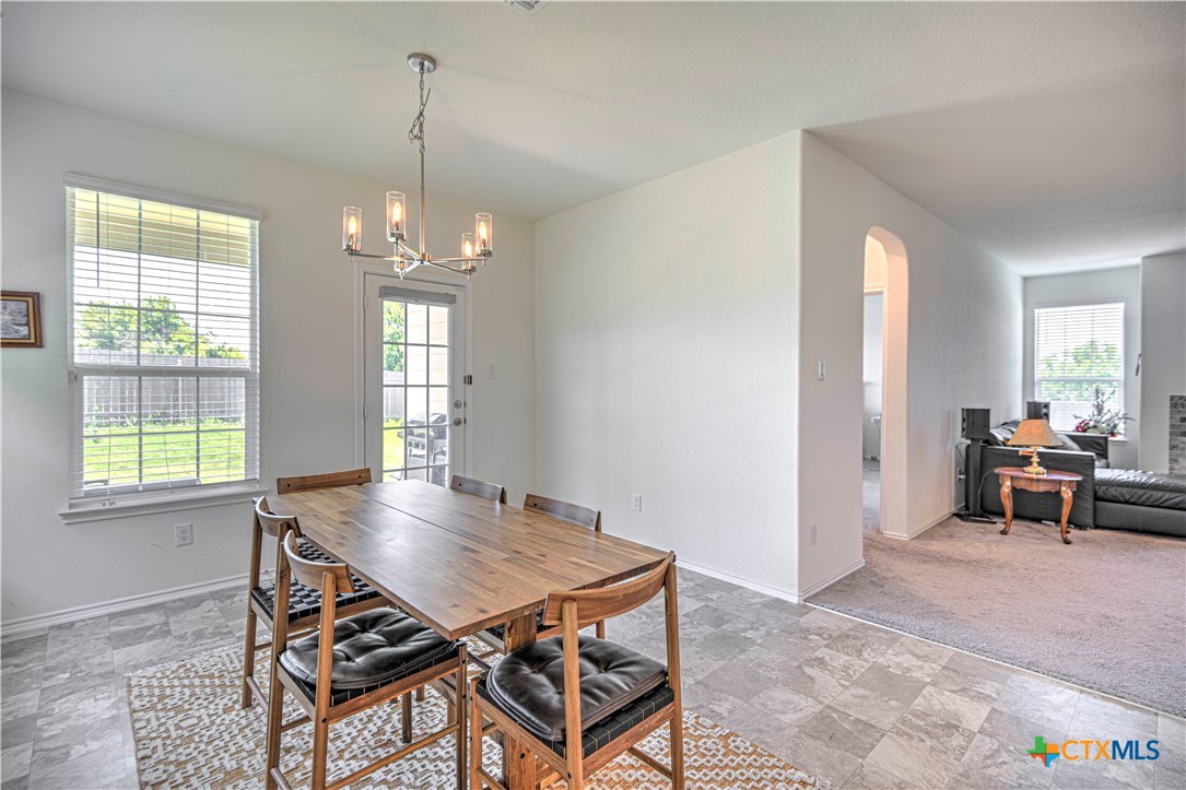 119 Lucky Texan Cove Jarrell, TX 76537 - Photo 12 of 33 a dining room with furniture and window