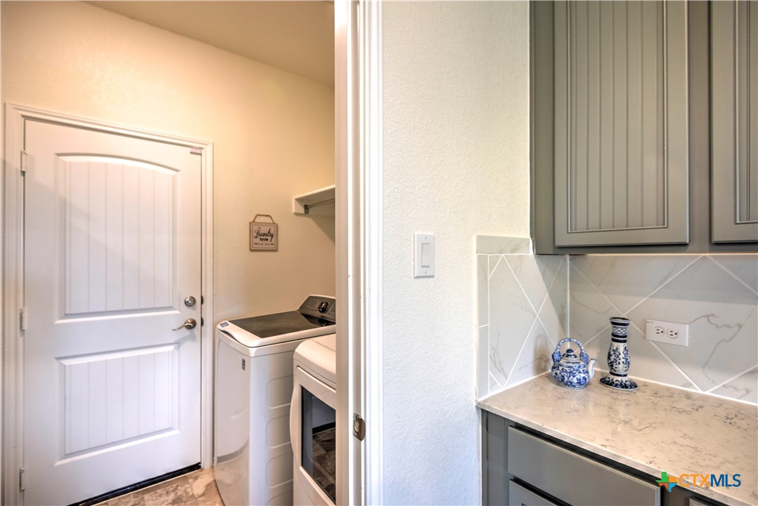 119 Lucky Texan Cove Jarrell, TX 76537 - Photo 17 of 33 a view of a storage and utility room with a sink