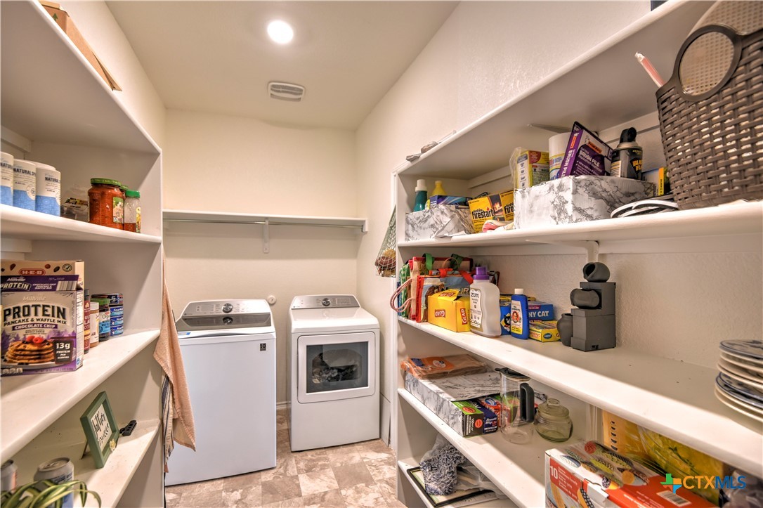 119 Lucky Texan Cove Jarrell, TX 76537 - Photo 19 of 33 a storage room with washer and dryer