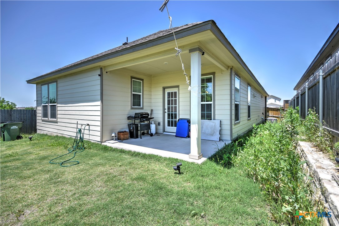 119 Lucky Texan Cove Jarrell, TX 76537 - Photo 30 of 33 a view of a house with backyard and porch