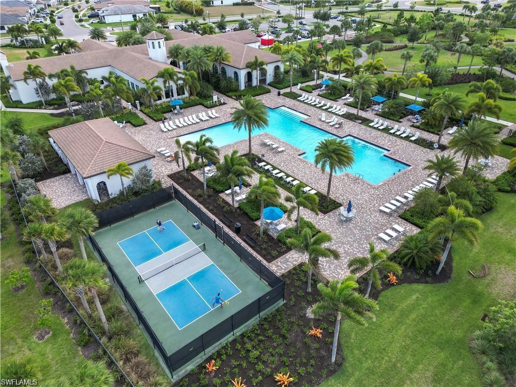 5538 Useppa Drive Ave Maria, FL 34142 - Photo 30 of 35 an aerial view of a house with a garden and swimming pool