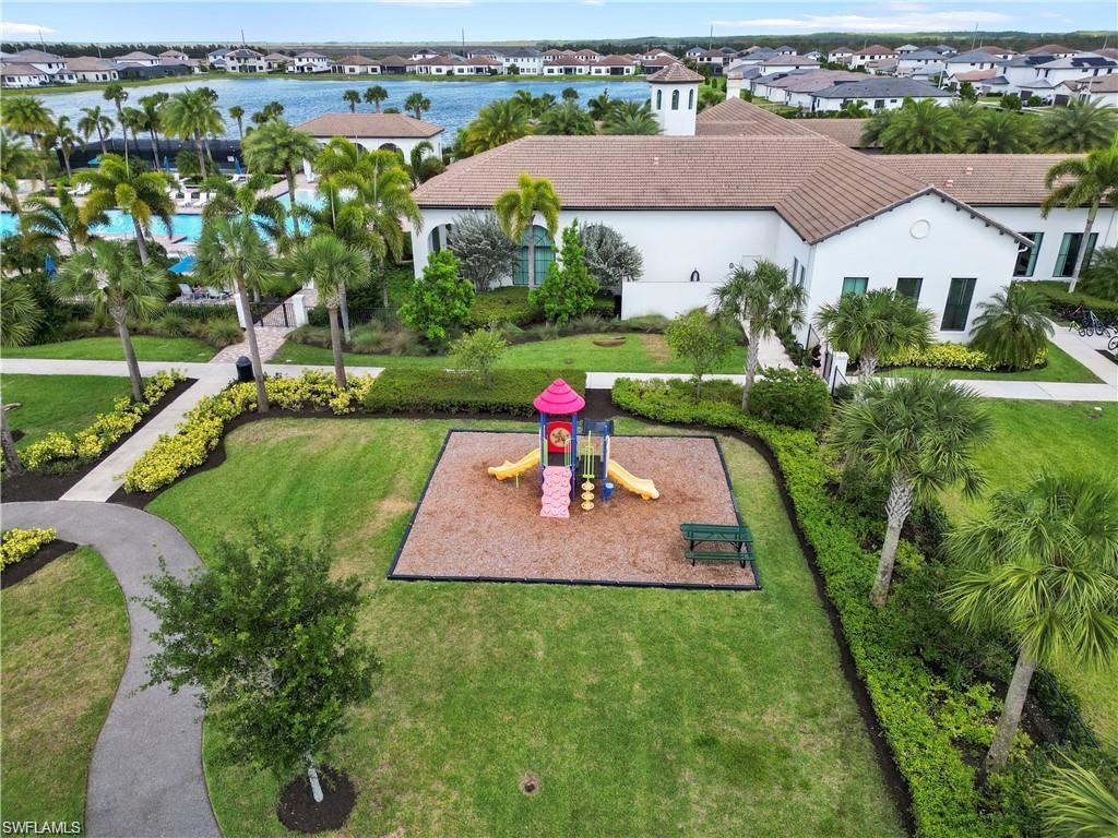 5538 Useppa Drive Ave Maria, FL 34142 - Photo 31 of 35 an aerial view of a house with a garden