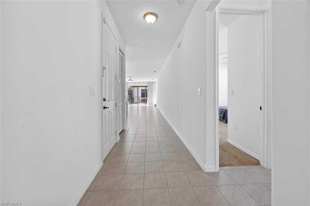 5538 Useppa Drive Ave Maria, FL 34142 - Photo 7 of 35 a view of a hallway with an entryway