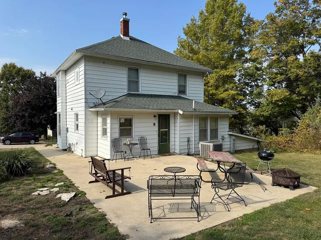 a view of a house with patio