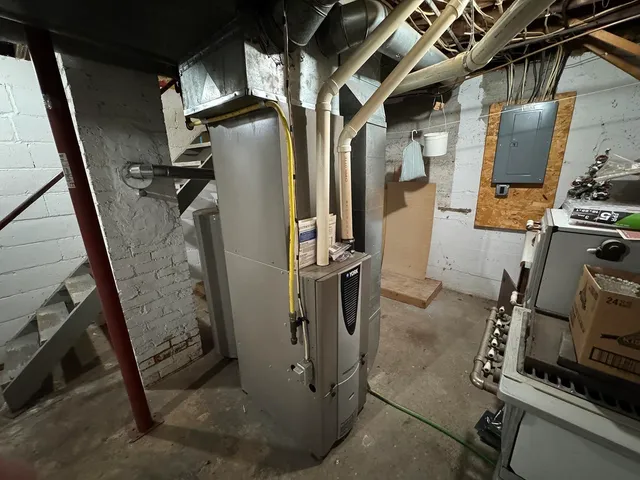 a bathroom with a shower and a sink