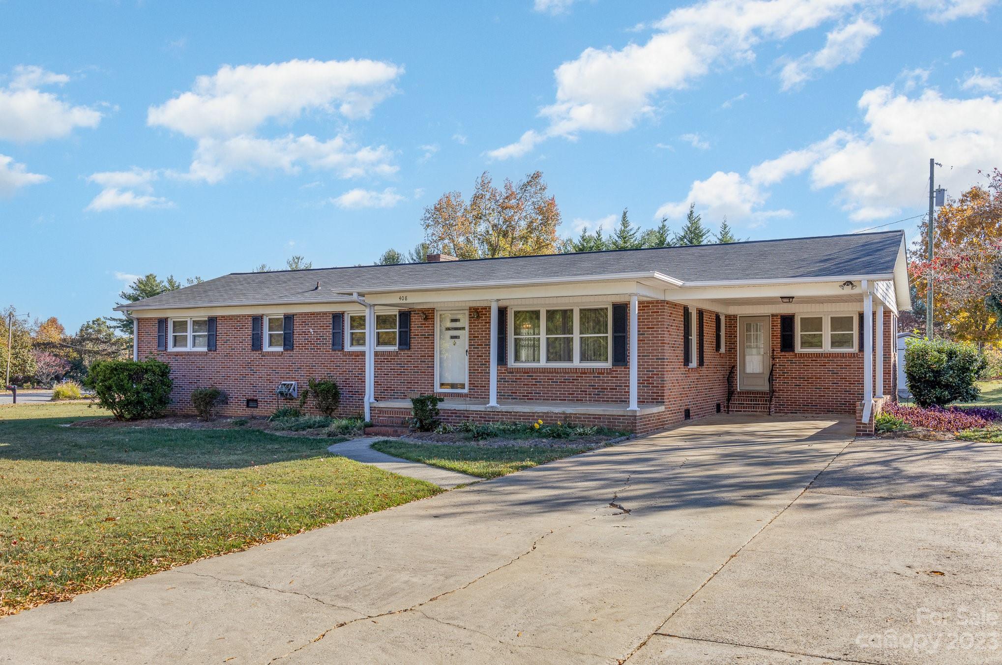 408 Jane Street Cherryville, NC 28021 - Photo 2 of 15 a front view of a house with a yard