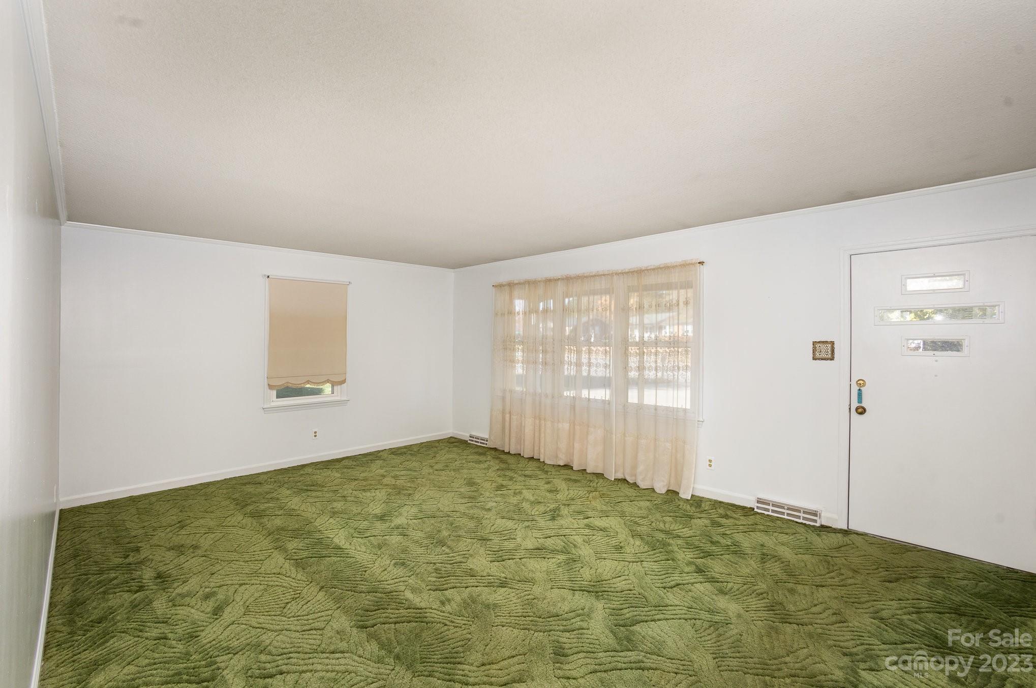 408 Jane Street Cherryville, NC 28021 - Photo 7 of 15 a view of an empty room with a window