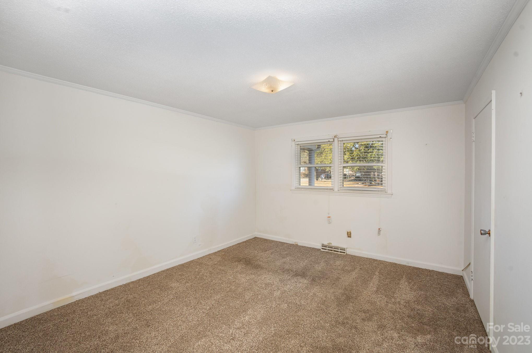 408 Jane Street Cherryville, NC 28021 - Photo 10 of 15 an empty room with a window