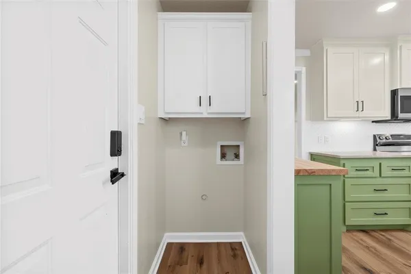 a bathroom with a shower and a sink
