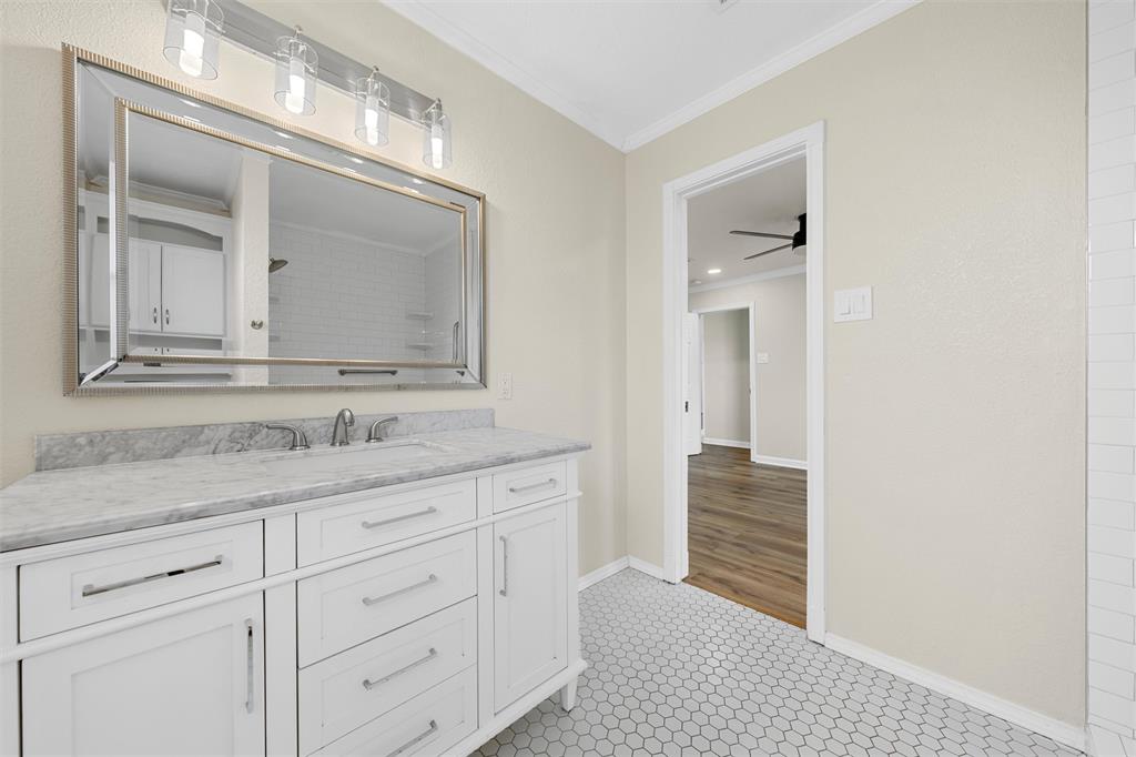 4401 Lacey Circle Waco, TX 76708 - Photo 18 of 38 a bathroom with a sink and a mirror