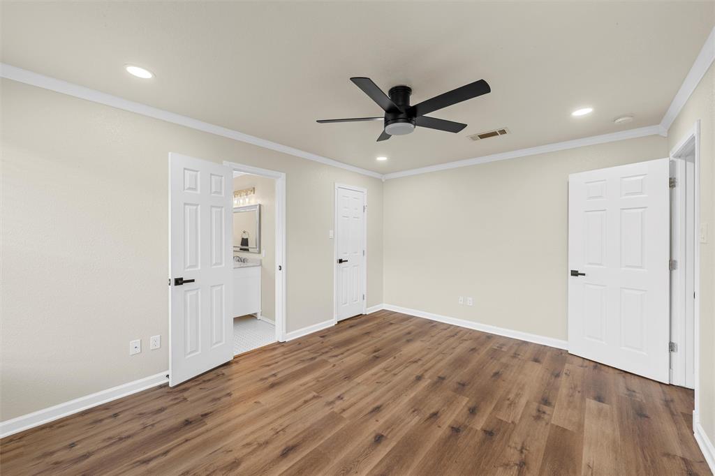4401 Lacey Circle Waco, TX 76708 - Photo 24 of 38 a view of empty room with wooden floor and fan